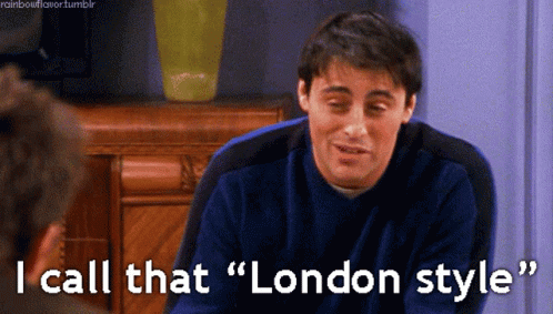 Man in Blue Sweater Saying London Style