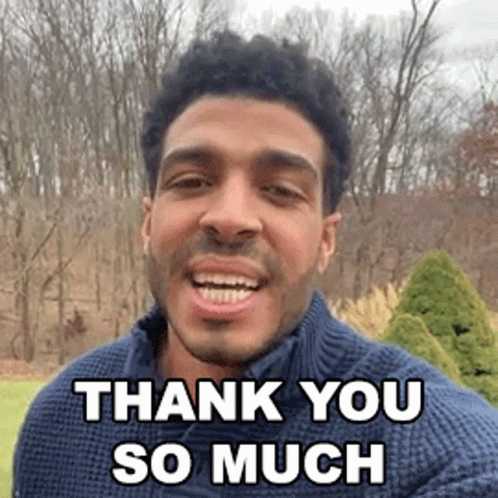 Man in Blue Sweater Saying Thank You
