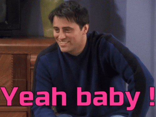 Man in Blue Sweater Saying Yeah Baby