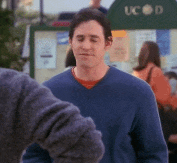 Man in Blue Sweater Says It's Right in Front of Us