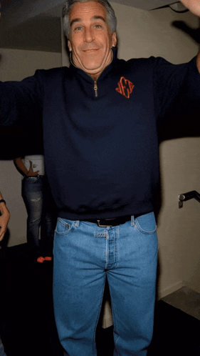 Man in Blue Sweater with Monogram