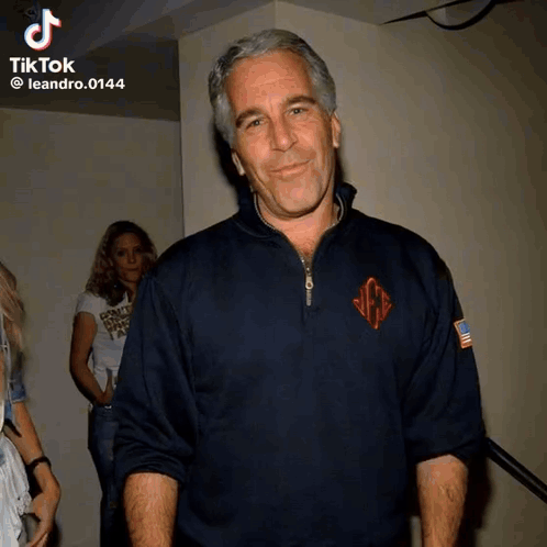 Man in Blue Sweater with Monogram
