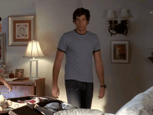 Man in Blue T-Shirt Standing