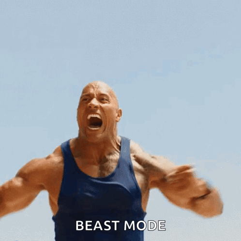 Man in Blue Tank Top Screaming Beast Mode