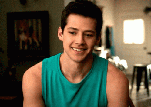 Man In Blue Tank Top Smiling In Front Of Dog Picture GIF