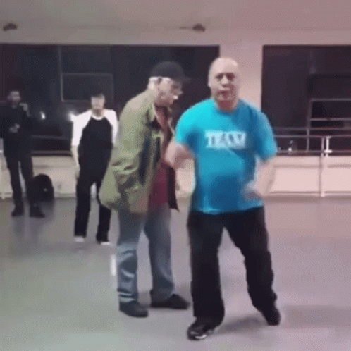 Man In Blue Taxi Shirt Dancing GIF
