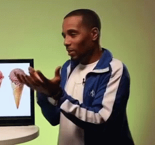 Man in Blue White Jacket Holding Ice Cream