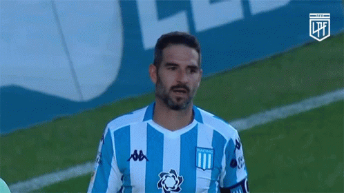 Man in Blue White Striped Shirt Saying Racing