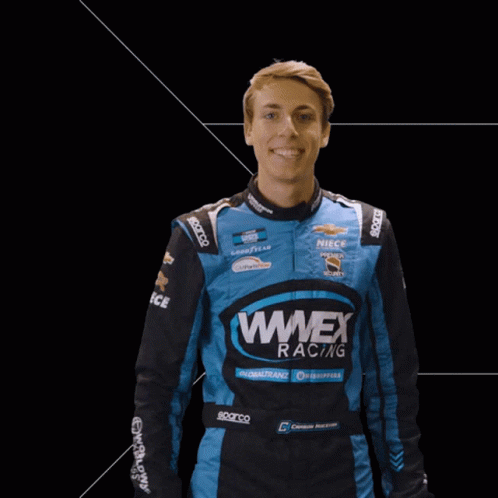 Man In Blue Wnex Racing Jacket Waving GIF