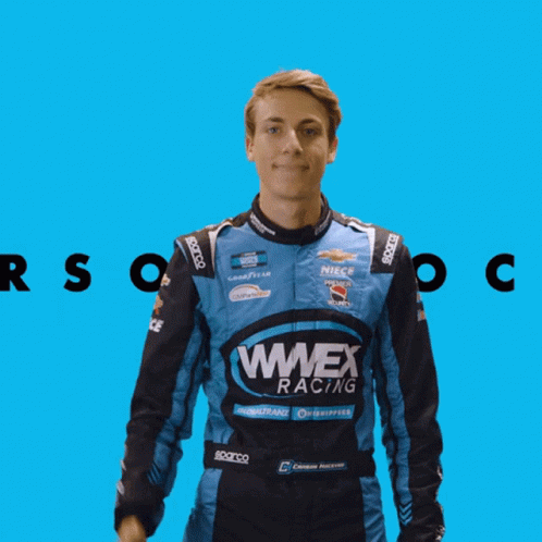 Man In Blue Wwex Racing Jacket Waving GIF