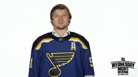 Man in Blues Jersey Giving Thumbs Up