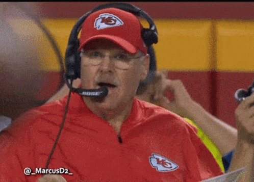 Man in Bose Headset and Red Hat