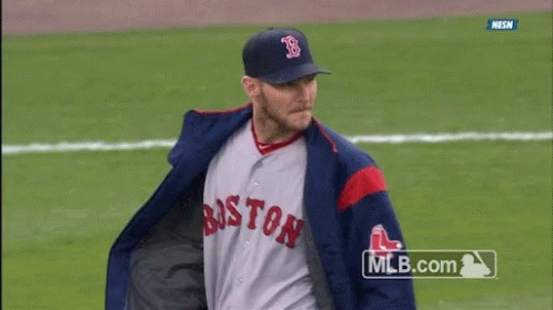 Man in Boston Baseball Uniform Smiling on Field