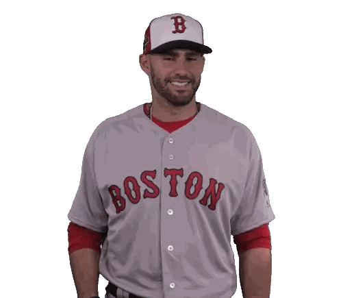Man in Boston Jersey Adjusts Baseball Cap