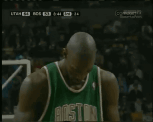 Man In Boston Jersey Holding Basketball GIF