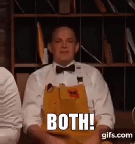 Man In Bow Tie And Apron By Bookshelf GIF