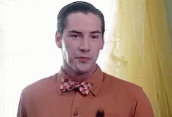 Man in Bow Tie at Window