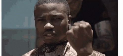 Man In Bow Tie Getting Haircut GIF