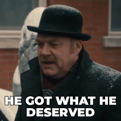Man In Bowler Hat And Coat Says He Got What He Deserved GIF