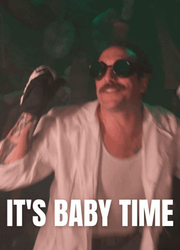 Man in Boxing Gloves and Sunglasses Saying It's Baby Time