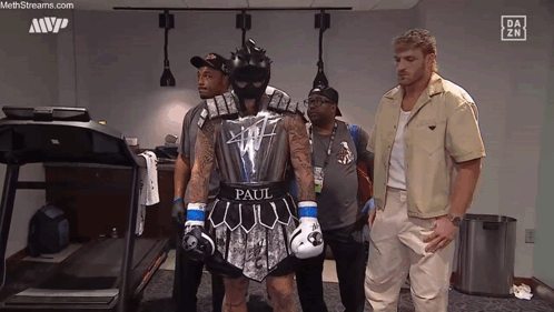 Man in Boxing Outfit with Paul