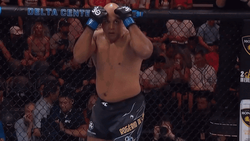 Man In Boxing Ring Before Delta Center Sign GIF