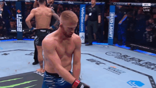 Man In Boxing Ring With Bud Light Sign GIF