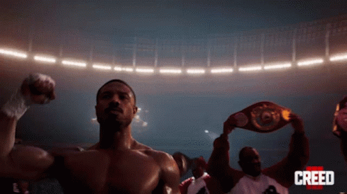 Man in Boxing Ring with Creed