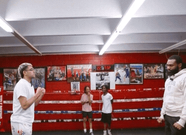 Man in Boxing Ring With Docomo