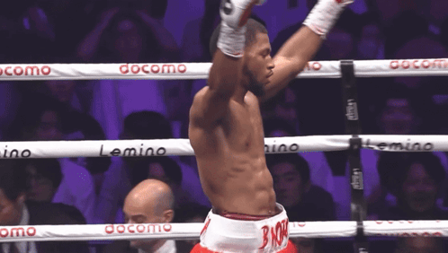 Man in Boxing Ring With Docomo on Ropes