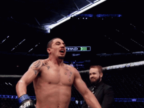 Man In Boxing Ring With Etihad Sign GIF