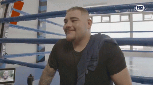Man in Boxing Ring With Fox Sports Logo