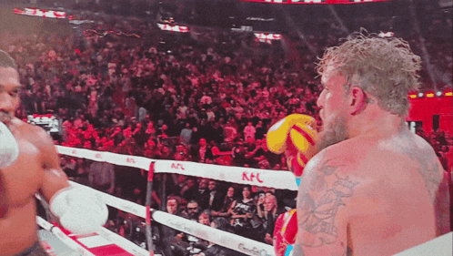 Man In Boxing Ring With KFC Banner GIF