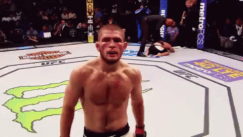 Man In Boxing Ring With Metropcs Banner GIF