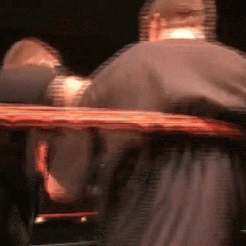 Man in Boxing Ring with Red Rope