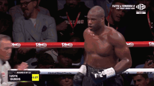 Man in Boxing Ring with Ribbons