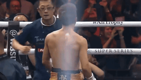 Man In Boxing Ring With Super Series Sign GIF
