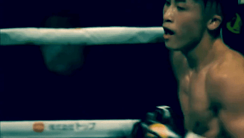 Man In Boxing Ring With T7 Sign GIF