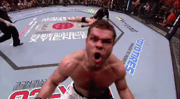 Man In Boxing Ring With Toyo Tires Ad GIF
