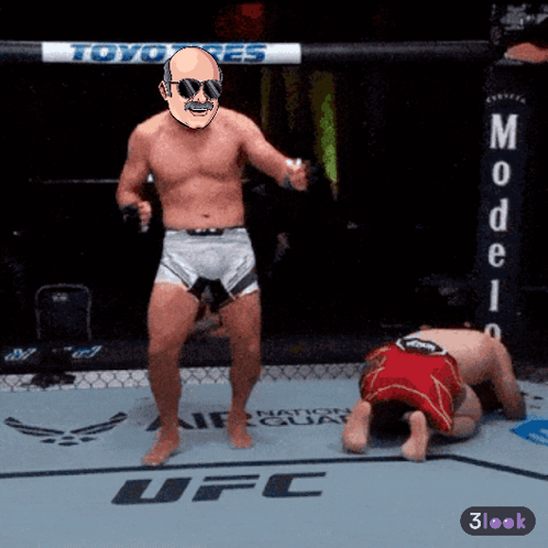 Man in Boxing Ring with UFC Logo