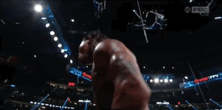 Man in Boxing Ring With UFC Logo