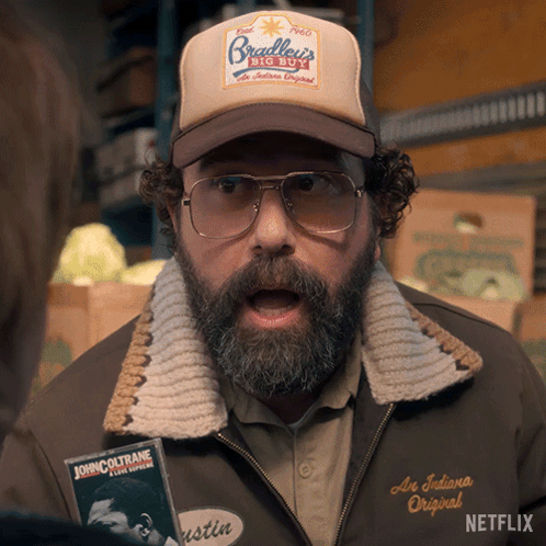Man In Bradley's Big Buy Hat GIF