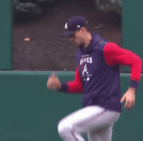 Man In Braves Shirt Dancing On Field GIF