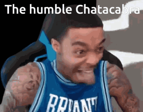 Man In Brian Jersey Making Funny Face In Chair GIF
