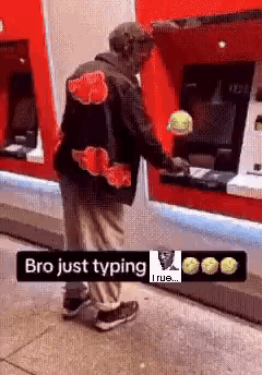 Man in Bro Just Typing Jacket at ATM