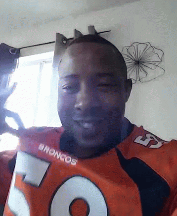 Man In Broncos Jersey Smiling GIF