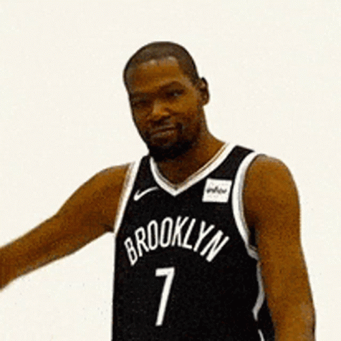 Man In Brooklyn Jersey Flexing Muscles GIF