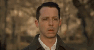 Man In Brown Coat Serious Look GIF