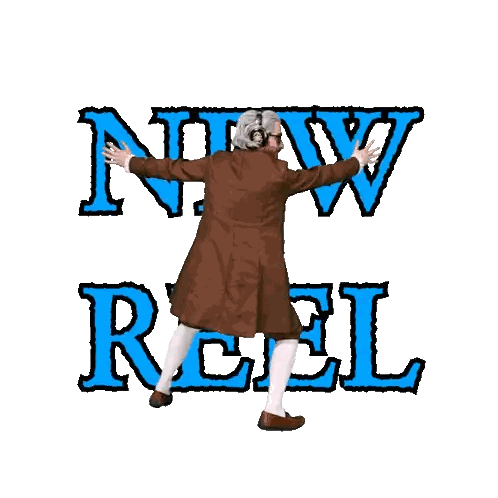Man in Brown Coat Standing by New Reel Sign