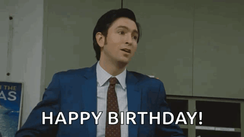 Man In Brown Coat With Serious Look GIF